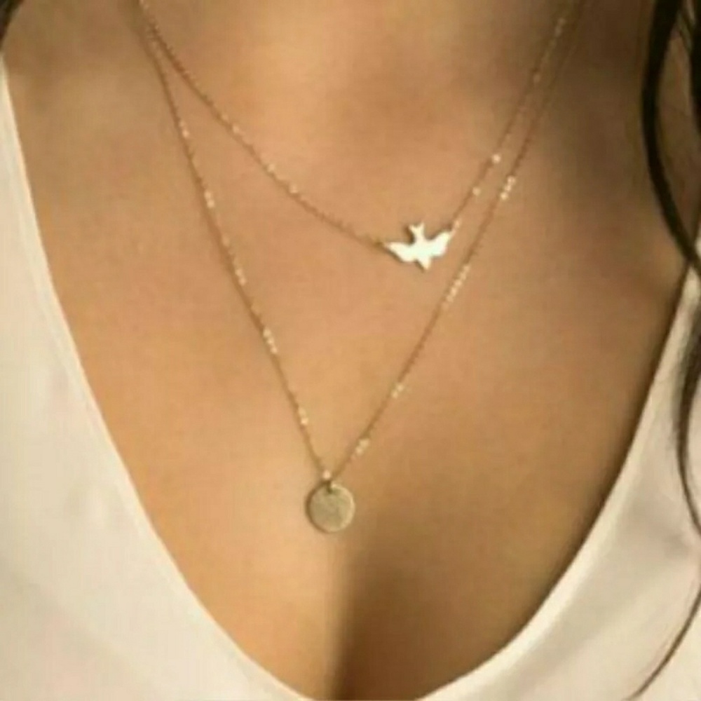Delicate Gold bird Necklace